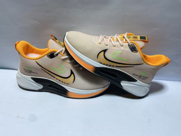 Nike Air Velocity - Yellow-Orange | Lightweight & Stylish Sneakers - Image 2